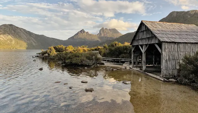 The historic Dove Lake boatshed with Cradle Mountain behind